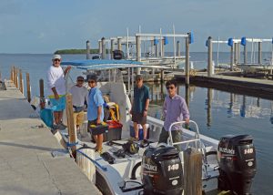 Shaojie (far right) sets off for a three-day research cruise in the Florida Keys with colleagues from the University of Massachusetts – Boston and Florida International University, March 2016. (Photo by Chuanmin Hu)