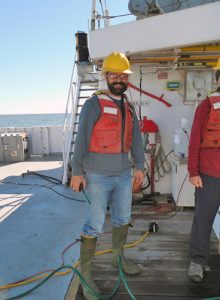 Adam stands by on the deck of the R/V Point Sur to retrieve the CTD rosette. (Photo by Alison Deary)
