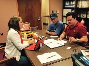 Heather Dippold (CONCORDE Education & Outreach) meets with boat captain Mr. Hoang Nguyen Van (middle) and Mr. Peter Nguyen (Mississippi State University Coastal Research and Extension Center) to discuss data collection and community meetings. Photo credit: Jessica Kastler