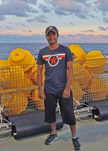 Sakib stands on the deck of the R/V Pelican during LADC-GEMM’s 2015 recovery cruise. (Photo by Natalia Sidorovskaia)
