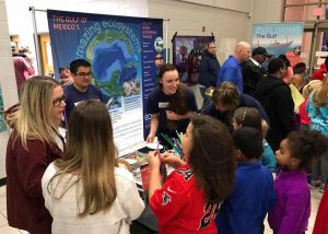ECOGIG outreach staff and graduate students visited Trip Elementary in Grayson, GA to share the Ocean Discovery Zone with students and families at their 2017 family STEM night. The annual event draws a large crowd of people including over 300 kids. Photo by ECOGIG.