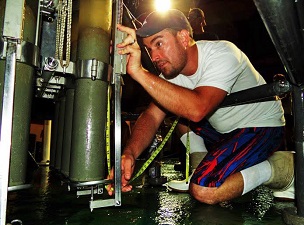 unnamed_slider Patrick Schwing measures a sediment core extracted from the Gulf of Mexico seafloor. Photo Credit: Devon Firesinger 2015