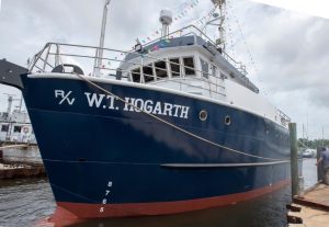 The W.T. Hogarth is lowered into the water for the first time. Photo by Eric Younghans, University of South Florida Health Communications