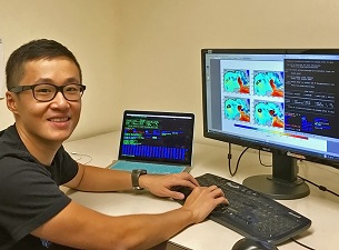 photo1_cropped_slider Shitao generates a visualization comparing satellite observational data to model simulations. (Photo by Suzhe Guan)