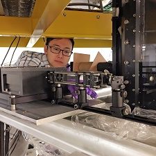 Image 3_slider Xinzhi adjusts the laser optics for particle image velocimetry experiments. (Provided by Xinzhi Xue)