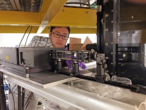 Image 3_slider Xinzhi adjusts the laser optics for particle image velocimetry experiments. (Provided by Xinzhi Xue)