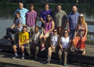 Devika (middle row, center) and Husseneder (middle row, far right) pose for a group photo with their research team. (Photo by Claudia Husseneder)