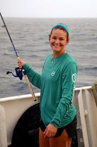 Angie uses a sabiki fishing rig aboard the R/V Point Sur during a Sargassum sampling cruise. (Photo credit: Brian Jones)