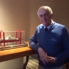 PeterBrewer_edited_2_slider Peter Brewer stands next to a model of the International Scientific Cooperation of the Chinese Academy of Sciences’ new ship in Qingdao. Photo provided by P. Brewer