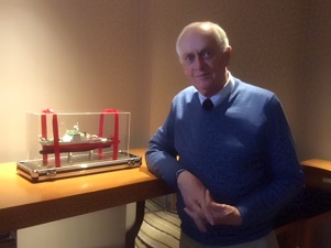 PeterBrewer_edited_2_slider Peter Brewer stands next to a model of the International Scientific Cooperation of the Chinese Academy of Sciences’ new ship in Qingdao. Photo provided by P. Brewer