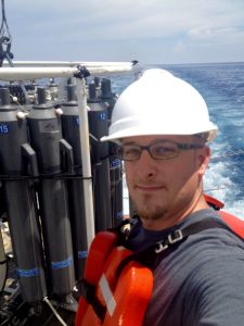 Researcher Brett D. Walker collects dissolved organic carbon samples aboard the R/V Pelican during the CARTHE pelagic research expedition. Afterwards at the University of California, Irvine, he measured their radiocarbon age. Photo credit: Brett Walker
