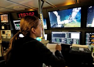 Danielle monitors ROV sampling efforts in the control room aboard the 2013 R/V Nautilus cruise. (Provided by ECOGIG)