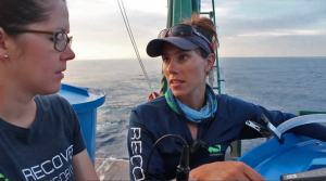 Rachael Heuer (left) and Lela Schlenker take water quality measurements and check tagged mahi-mahi in a recovery tanks aboard the R/V Walton Smith in summer 2017. (Photo by Dan DiNicola)
