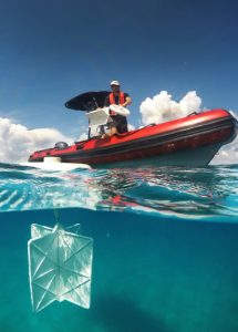 Study author Guillaume Novelli deploys the eco-friendly CARTHE drifters, which are designed to measure shallow-depth surface currents. Photo credit: Cédric Guigand.