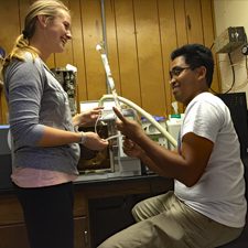Meredith and Hernando pyrolysis_slider Meredith Evans Seeley and Dr. Hernando Bacosa maintain the Py-GC-MS machine. (Provided by Meredith Evans)