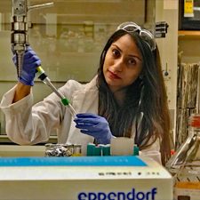 IMG1_slider Smruthi Karthikeyan inoculates cultures of the Macondimonas isolate recovered from oiled Pensacola beach sand. (Provided by Smruthi Karthikeyan)