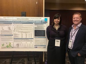 Tim Slack and Kathryn Keating during a poster presentation of first- and second-wave data analyses at the 2018 Annual Meeting of the Rural Sociological Society. (Provided by Kathryn Keating)