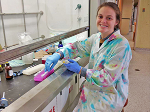 Samantha “Sam” Setta conducts DNA extractions with help from collaborators on the ADDOMEx team at Mount Allison University in Canada. (Photo by Laura Bretherton)