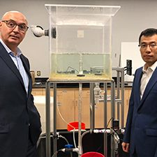 Tank1_slider Michel Boufadel and Feng Gao with a scaled reproduction of an underwater plume. (Provided by Michel Boufadel)