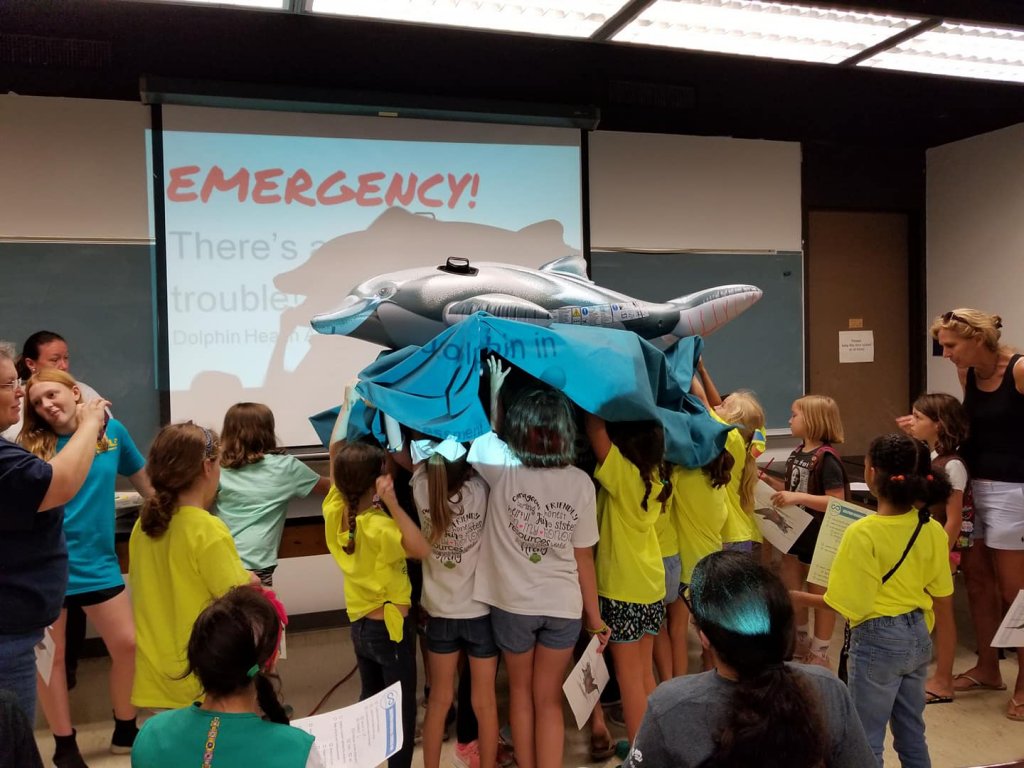 CARMMHA hosted several workshops and demonstrations at the Girl Scouts B.I.G. (Believe In Girls) event at the University of New Orleans. The girls learned about how scientists study dolphin health and participated in a mock dolphin assessment. See the CARMMHA website.
