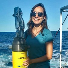 Fig1_slider Luna Hiron holds an Autonomous Profiling Explorer (APEX) float aboard the R/V Walton Smith for deployment in the Gulf of Mexico. (Provided by Luna Hiron)