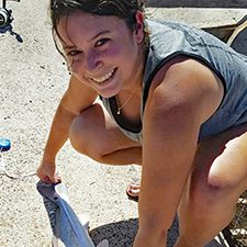 Picture 3_slider Alexis measures a red drum for her study. (Provided by Alexis Khursigara)
