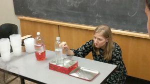 Jenna conducts an experiment investigating pressure heads and their hydrostatic relation for the Summer@Brown course “Studying the Ocean from Blackboards to Drones.” (Photo by Abigail Bodner)