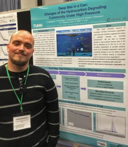 Steffen Hackbusch presents a poster at the 2016 Gulf of Mexico Oil Spill and Ecosystem Science conference. (Provided by Nuttapol Noirungsee)