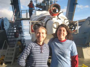 Study authors Dr. Samantha Joye (L) and Mary-Kate Rogener (R) in front of ALVIN, a manned deep-diving research submarine, during a 2014 Gulf of Mexico expedition. Photo courtesy of Dr. Andreas Teske, University of North Carolina Chapel Hill (ECOGIG).