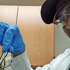 GopalBera_RFP5Knap_slider Dr. Gopal Bera, with the Geochemical and Environmental Research Group at Texas A&M University, displays a silicone tube filled with Macondo oil. This oil-filled tube is one of the passive dosing methods analyzed in this study for improved oil toxicity testing. Photo Credit: Kusumica Mitra