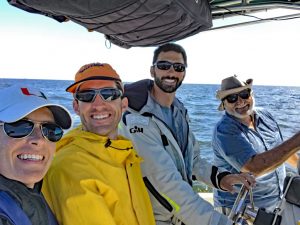 University of Miami Rosenstiel School of Marine and Atmospheric Science researchers (L-R, Laura Bracken, Matt Grossi, Conor Smith, and Mike Rebozo) aboard the R/V Argus during the 2017 Submesoscale Processes and Lagrangian Analysis on the Shelf (SPLASH) experiment. (Photo credit: Laura Bracken)