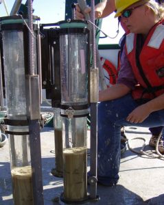 Eckerd College's Rebekka Larson retrieves sediment collected November 2010 using an Ocean Instruments MC-800 aboard the R/V Weatherbird II. The sediment cores are used to investigate sedimentary impacts of the 2010 Deepwater Horizon incident. Photo credit: Patrick Schwing.