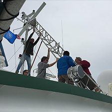 CARTHE-LASER_MarineRadarAntenna_slider Study author Brian Haus (University of Miami Rosenstiel School of Marine and Atmospheric Science) and CARTHE research team members set up the X-Band Radar tower (takes 1 m resolution wave measurements in a 3 km radius) on the research vessel F.G. Walton Smith. Credit Tamay Ozgokmen