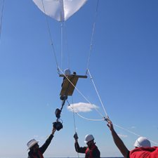CARTHE_Carlson_STARRSLaunch5_slider CARTHE researchers launch the Ship Tethered Aerostat Remote Sensing System (STARSS) from the M/V Masco VIII during the Lagrangian Submesoscale Experiment (LASER). STARSS was part of a large-scale oceanographic campaign designed to observe oceanic dispersion over a wide range of spatial and temporal scales and understand transport and dispersion of oil and other buoyant materials. Left to right: Jean Mensa, Guillaume Novelli, undergraduate student Mike, Daniel Carlson, and Cedric Guigand. Photo credit: Maristella Berta (National Research Council-Institute of Marine Science, CNR-ISMAR, Venice, Italy).