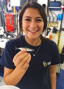 Nina Pruzinsky holds a juvenile little tunny (Euthynnus alletteratus) that she identified on the DEEPEND DP06 cruise. (Photo by Natalie Slayden)