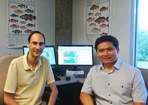 Xuetao Lu (R) and his advisor Dr. Steven Saul, College of Integrative Sciences and Arts at Arizona State University (Polytechnic Campus) discuss his statistical research progress on the spatial analysis of Gulf of Mexico reef fish. (Provided by Xuetao Lu)