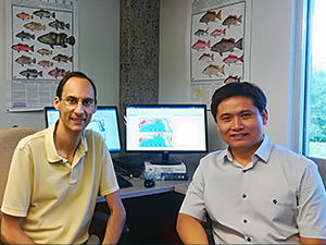 RFP-V Saul_Scholar_Lu2_slider Xuetao Lu (R) and his advisor Dr. Steven Saul, College of Integrative Sciences and Arts at Arizona State University (Polytechnic Campus) discuss his statistical research progress on the spatial analysis of Gulf of Mexico reef fish. (Provided by Xuetao Lu)