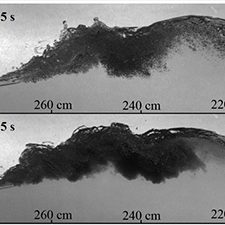 Figure 5 From Chen Li_slider Droplets and bubble clouds for waves and slicks of (a) crude oil and (b) oil-dispersant mixture at 1:25 ratio. Individual crude oil droplets and bubbles are discernible in (a). However, the oil-dispersant mixture in (b) forms an opaque cloud with droplets sizes that fall well below the resolution range of the high-speed imaging system. Image credit: The Joseph Katz Lab and author Cheng Li, Ph.D., Mechanical Engineering, Johns Hopkins University Postdoc Fellow, Saint Anthony Falls Laboratory, University of Minnesota.