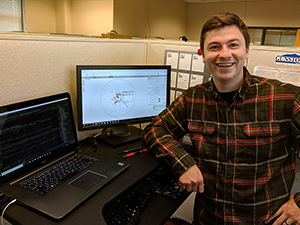RFP-V Thomas_Scholar_Sevigny1_slider Ph.D. student Joe Sevigny conducts bioinformatics analyses at the University of New Hampshire Hubbard Center for Genome Studies. (Photo by Steve Simpson)