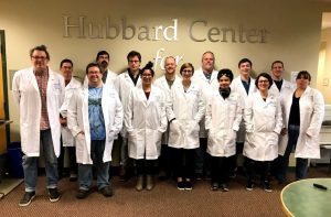Ph.D. student Joe Sevigny (back row, second from right) is a member of the Hubbard Center for Genome Studies research group at the University of New Hampshire. (Photo by Ashlee Warzin)