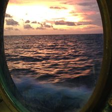 KelseyRogers_GOMViewFromEndeavor_slider The Gulf of Mexico as seen from inside the vessel Endeavor during a research cruise. Photo by Kelsey Rogers, 2013