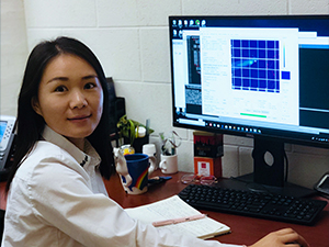 University of Miami Ph.D. student Chao Ji with the SOSim (Subsurface Oil Simulator) model. (Provided by Chao Ji)