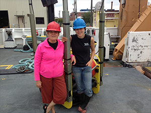 Study co-authors Melissa Soldevilla (left) and Kait Frasier (right), prepare a High-frequency Acoustic Recording Package (HARP) for deployment from the NOAA Ship Gordon Gunter. Using Passive Acoustic Monitoring (PAM) technology during and following Deepwater Horizon, they were able to estimate population densities for the cryptic pygmy sperm and dwarf sperm whales. Photo by John Hildebrand.
