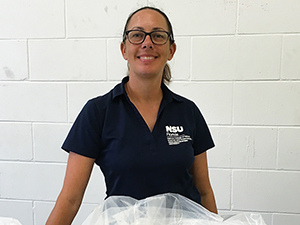 Nova Southeastern University master’s student Dawn Bickham assists with the shipment of coral colonies to the Florida Coral Disease Rescue Project. (Provided by Abigail Renegar)