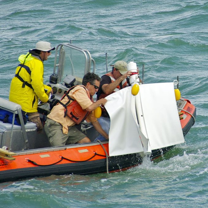 CARTHEpic In preparation for the live deployment experiment, research teams field test the process to accurately release drifters – a critical component for the success of this project. Top left to right: Marine Operator David Nadeau, GLAD Cruise Chief Scientist Dr. Brian Haus, and CARTHE Director Dr. Tamay Özgökmen. Photo Credit: Josefina Olascoaga, CARTHE and University of Miami.