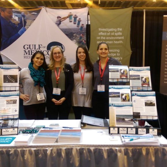 IMAG2568 Photo Caption: (from left to right) Emily Maung-Douglass from the Gulf of Mexico Sea Grant Oil Spill Science Outreach team, Katie Fillingham from the Gulf of Mexico Research Initiative (GoMRI) management team, Rosalie Rossi from the Gulf of Mexico Research Initiative Information and Data Cooperative (GRIIDC), and Jessie Swanseen from the GoMRI management team exhibit at the 2018 Clean Gulf Conference in New Orleans, Louisiana from November 14-15, 2018. Photo Credit: Katie Fillingham.
