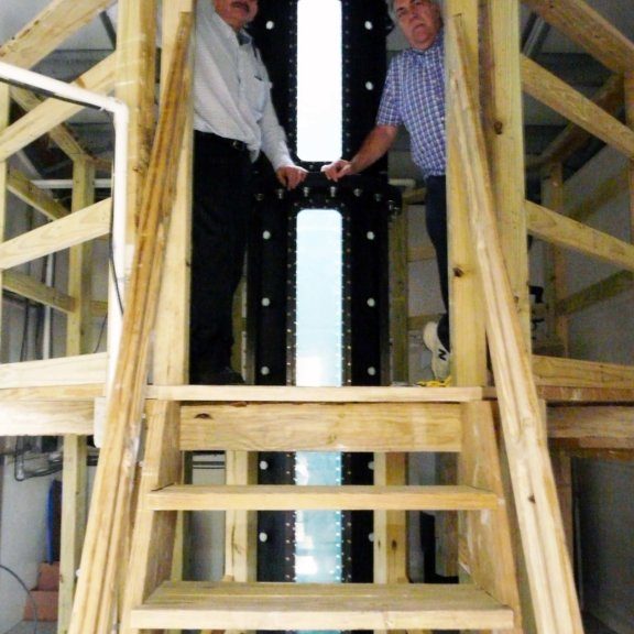 13 Joe Katz (left) and Ed Buskey (right) stand at the top of the mesocosm tank at Johns Hopkins University. Photo Credit: Brad Gemmell, UTMSI.
