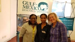 C-IMAGE outreach coordinators Teresa Greely (right) and Angela Lodge (left) with graduate student Theodora Sam from Guana at EMSEA. Photo Credit: Teresa Greely.