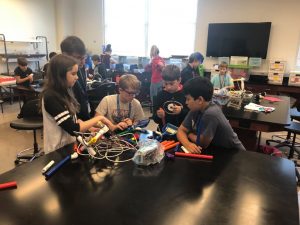Students build an ROV during the ECOGIG Ocean Discovery Camp. Photo Credit: ECOGIG/Original photo via ECOGIG’s Facebook page.